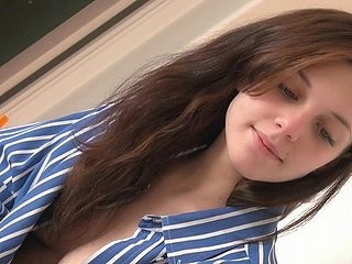 The enticing tee-shirt encircling the big breasts, painted, straightens the enlivenment of the vibed stud
