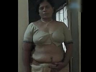 Witness a curvy Desi MILF in this super-steamy video