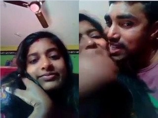 Desi duo shares a spunky smooch in couch