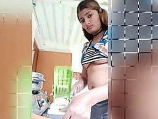 Naidu Swathi's enticing kitchen spectacle with a nip-slipping surprise