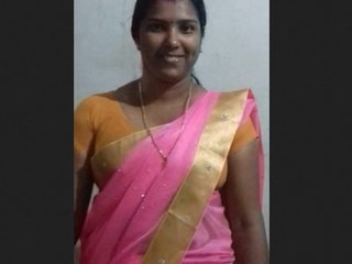 Observe a sumptuous Tamil bhabhi flaunt her massive  in a super hot video