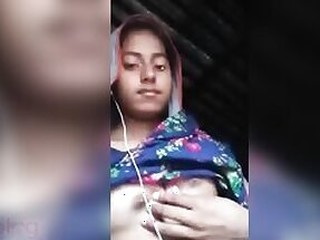 Pretty girl Desi demonstrates her teen pussy with big bosoms on camera