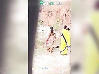 Milf in yellow joins urinating aunt Desi in Gonzo video to keep moving