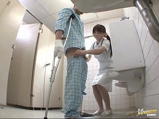 Asian nurse uses her strength to collect a sample from a patient