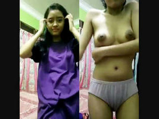 Desi schoolgirl flaunts her hooters and vagina in a naughty video