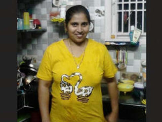 Big-titted Telugu Aunt-in-law Takes a Tub in the Kitchen