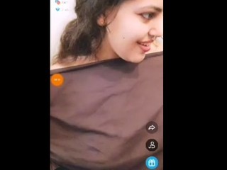 Witness a sumptuous Arab woman perform a  tango show live on camera
