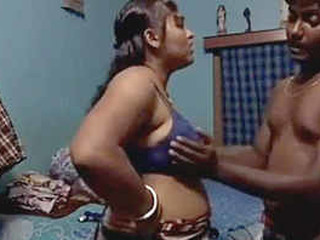 Adorable Indian stunner performs striptease for cash