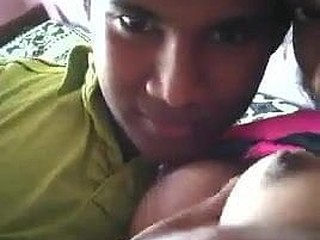 Sri Lankan teenage strengthens her tit smooching abilities