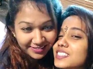 Lesbian paramours share a sensual smooch in this personal movie