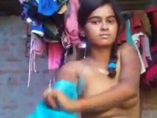 A rural dame undresses down to her lingerie