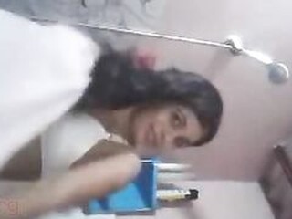Steamy teenager from Chennai films herself showering in the douche
