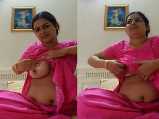Punjabi bhabhi in pinkish salwar kameez takes a wonderful selfie and bellows