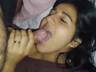 Indian wifey gives a satisfying oral pleasure to her British spouse and receives a mouthhole of jism