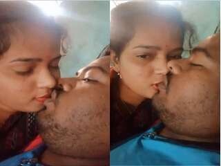 Desi duo shares a romantic smooch in couch